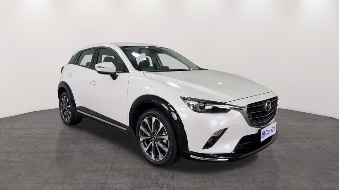 2023 Mazda CX-3 Stouring (fwd), Automatic, 20286 km, Right Front Diagonal (45- Degree) View