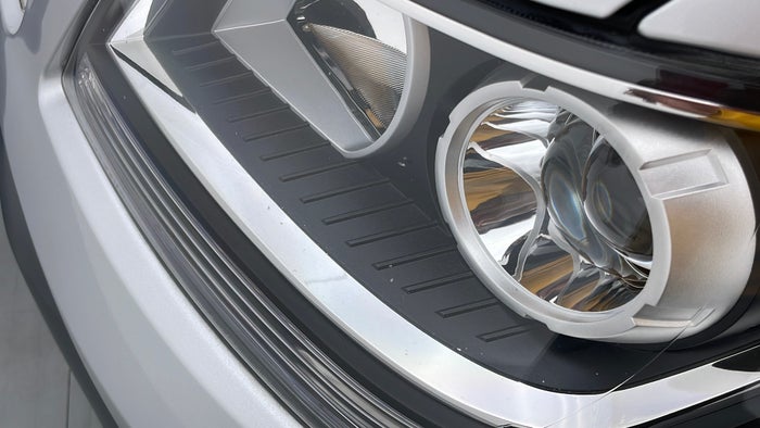 Kia Mohave-Head Light LHS Scratch