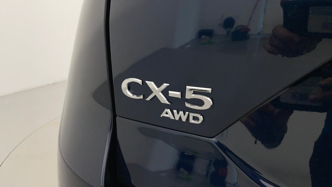 2025 Mazda CX-5 G25 Touring (AWD), Automatic, 5640 km, Badge (Boot Left Side)