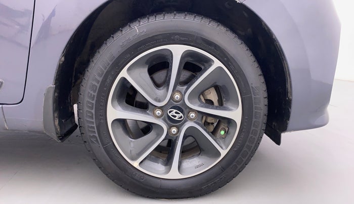 2017 Hyundai Grand i10 SPORTZ (O) 1.2 AT VTVT, Petrol, Automatic, 52,861 km, Right Front Wheel