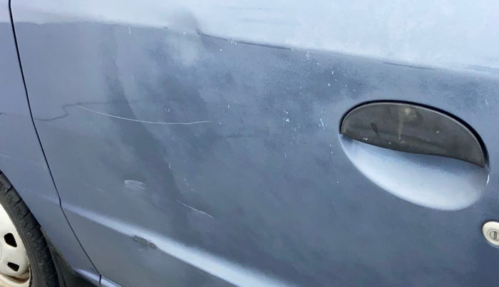 2013 Hyundai Santro Xing GL PLUS, CNG, Manual, 94,110 km, Front passenger door - Upto 4 inch Scratches + Count of scratches 3-5 ( Metal not Visible)