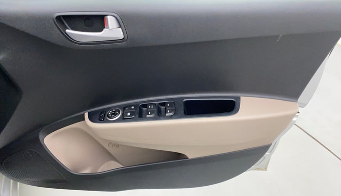 2017 Hyundai Grand i10 SPORTZ AT 1.2 KAPPA VTVT, Petrol, Automatic, 32,375 km, Driver Side Door Panels Control