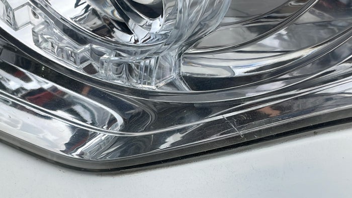 MITSUBISHI PAJERO-Head Light LHS Scratch
