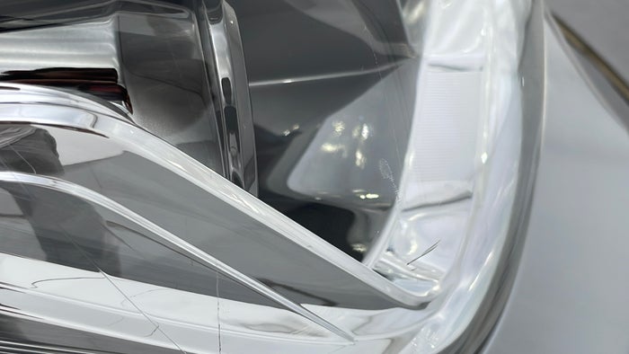 NISSAN PATROL-Head Light RHS Scratch