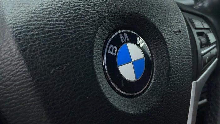 BMW X5-Steering Wheel Logo Faded