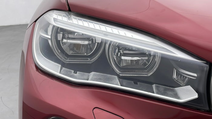 BMW X6-Head Light RHS Scratch