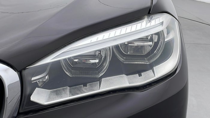 BMW X5-Head Light LHS Scratch