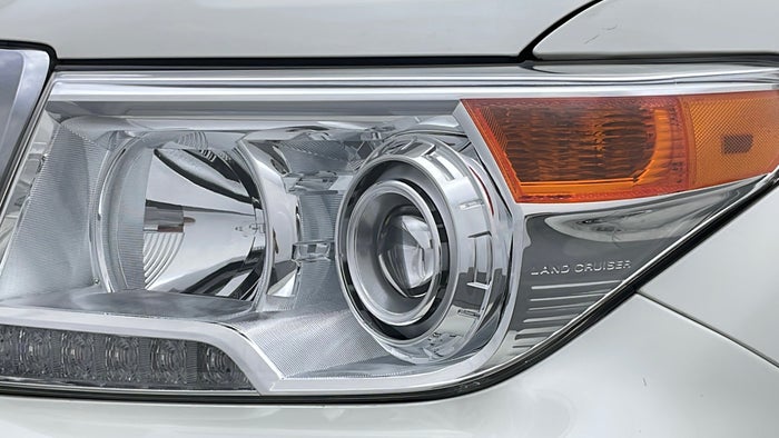 TOYOTA LAND CRUISER-Head Light LHS Scratch