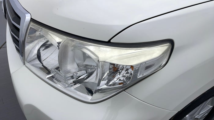 TOYOTA LAND CRUISER-Head Light LHS Fading