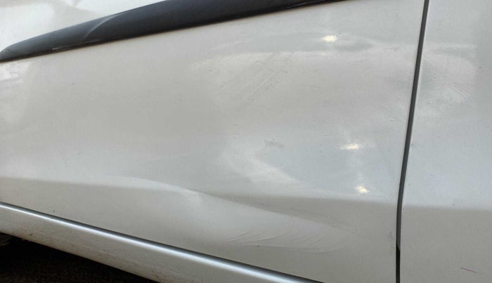 2017 Maruti Celerio ZXI AMT (O), Petrol, Automatic, 30,599 km, Front passenger door - Line - Paint ok & Dent >8 inch(Dent on Criase Line)