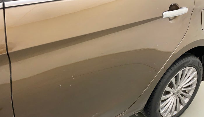 2017 Maruti Ciaz ALPHA 1.4 PETROL, Petrol, Manual, 65,385 km, Rear left door - Minor scratches