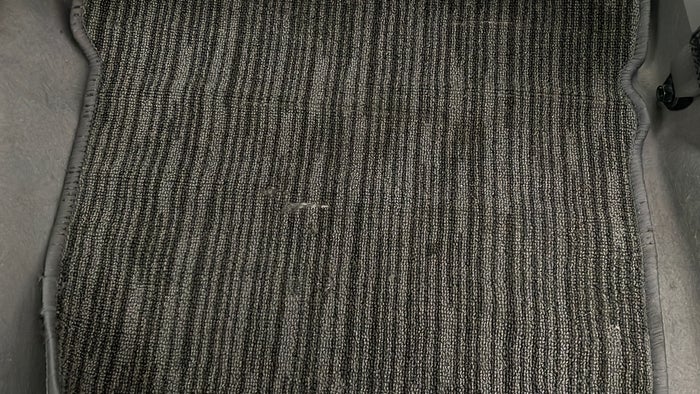 Nissan Sunny-Flooring Carpet torn/damaged