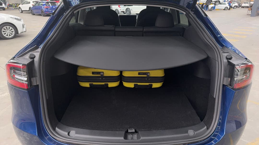 2024 Tesla Model Y Rear-wheel Drive, Automatic, 9165 km, Boot Inside View with Luggage