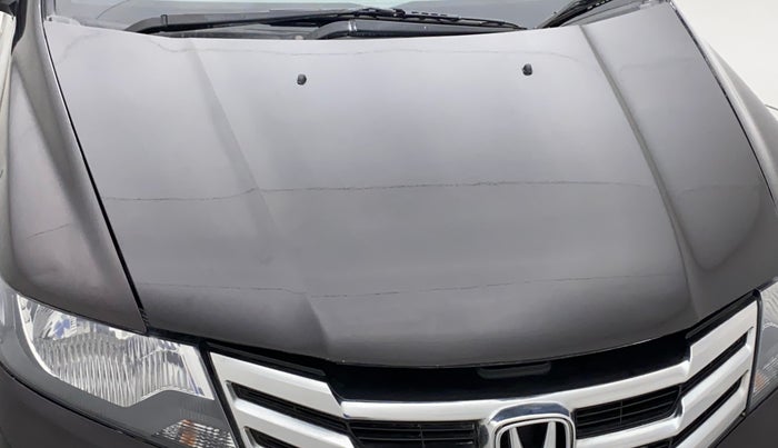 2012 Honda City 1.5L I-VTEC S MT, Petrol, Manual, 1,02,854 km, Bonnet (hood) - Insulation cover has minor damage