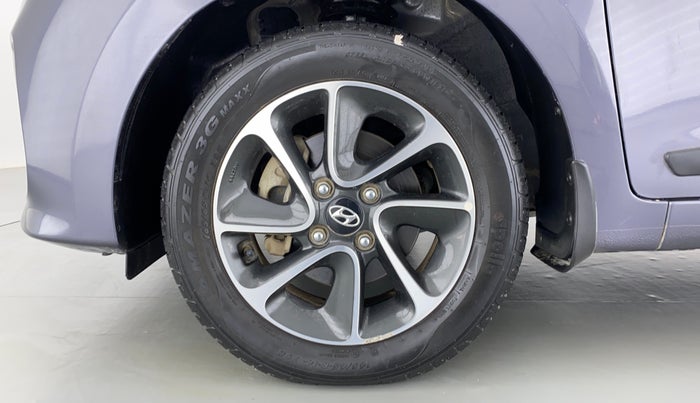 2017 Hyundai Grand i10 SPORTZ (O) 1.2 AT VTVT, Petrol, Automatic, 13,414 km, Left Front Wheel