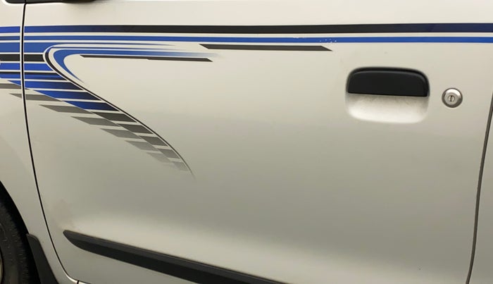 2014 Maruti Wagon R 1.0 LXI, Petrol, Manual, 57,764 km, Front passenger door - Graphic sticker