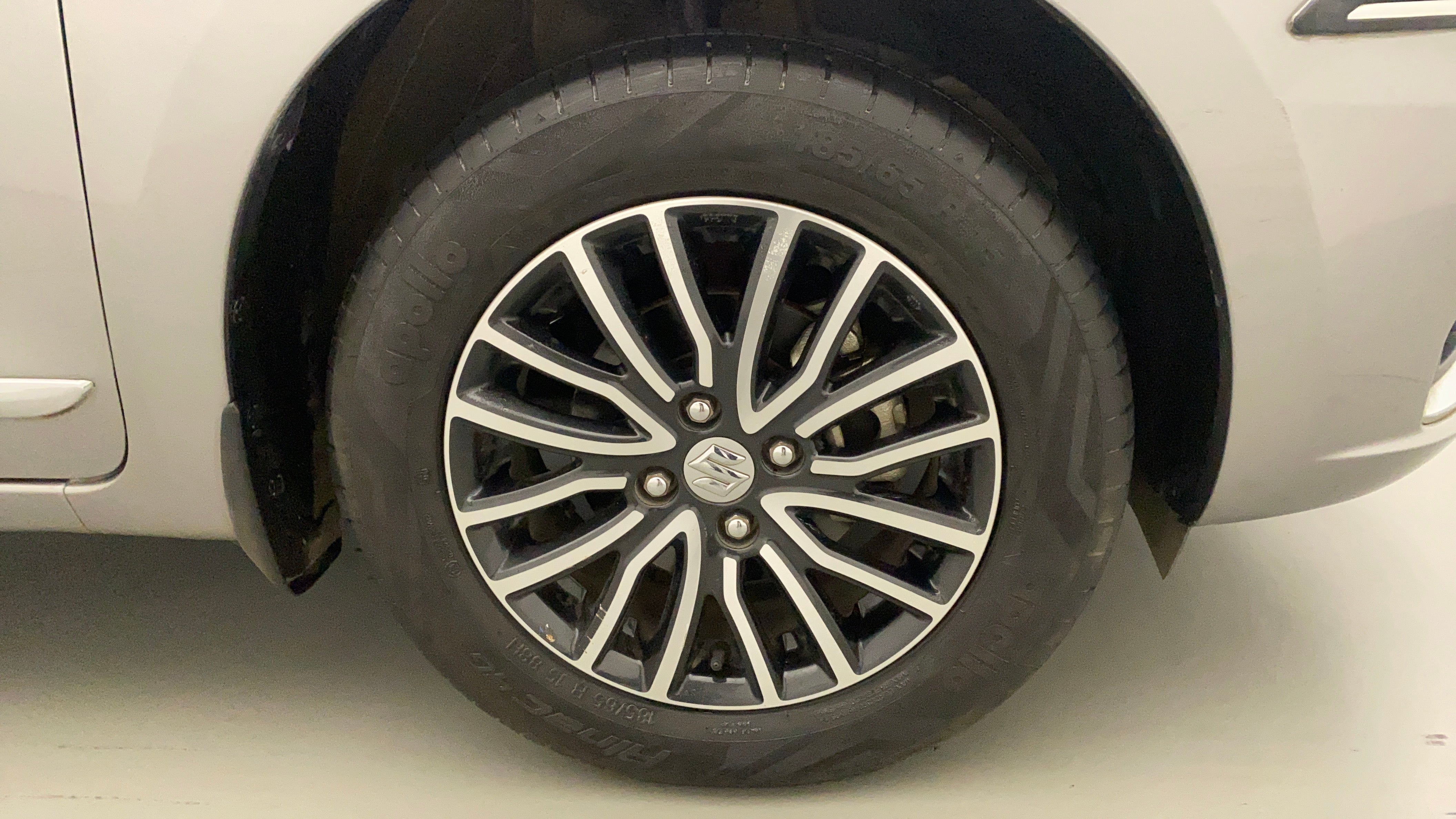 Dzire zxi on sale alloy wheels