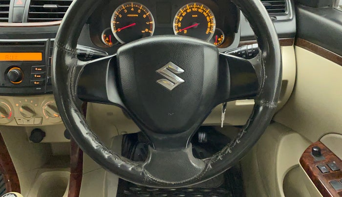 2012 Maruti Swift Dzire VXI, Petrol, Manual, 58,586 km, Steering wheel - Horn pad has minor damage