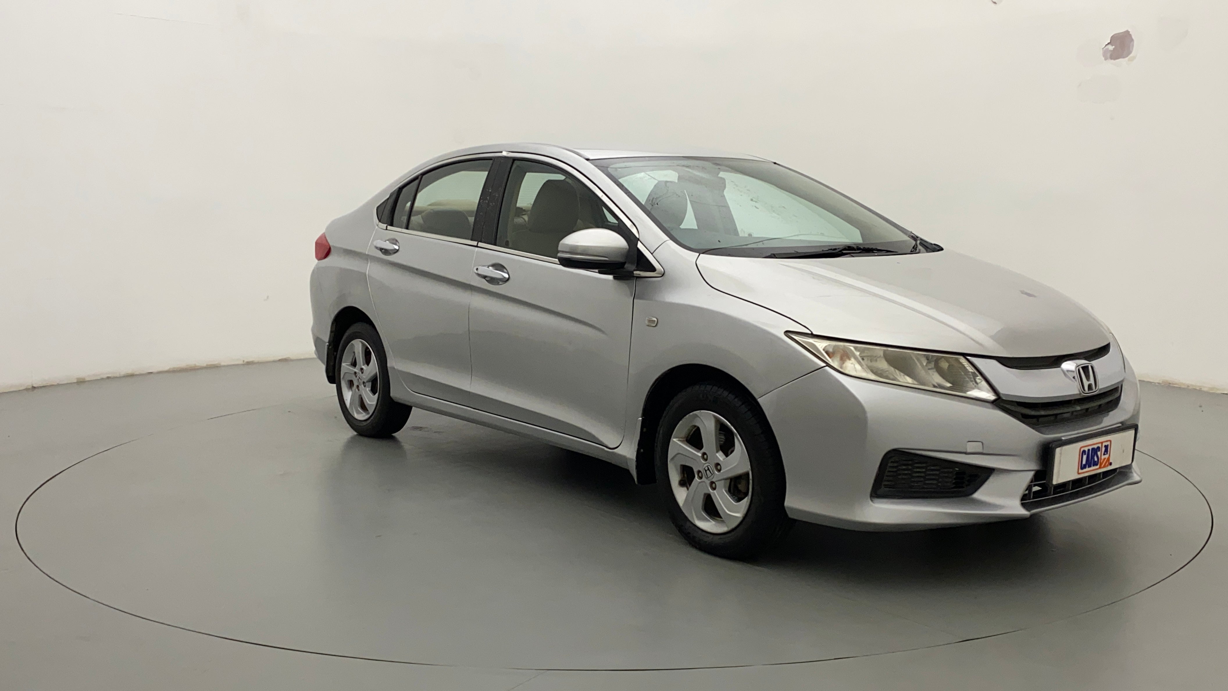 Honda city 1.5 e deals mt petrol price