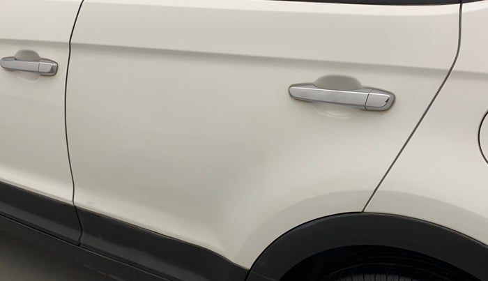 2016 Hyundai Creta SX PLUS 1.6 PETROL, Petrol, Manual, 1,06,748 km, Rear left door - Slightly dented