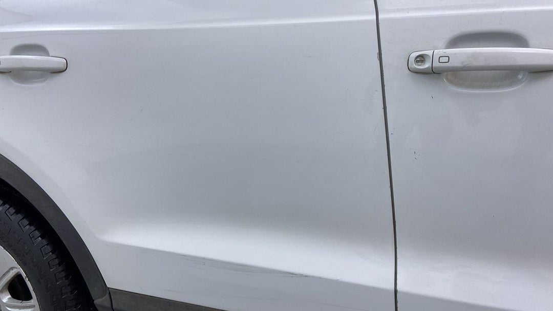 Right Rear Door Scratched (3 to 4 inches)