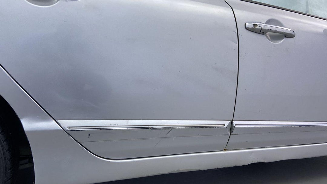 Right Rear Door Scratched (> 12 inches)