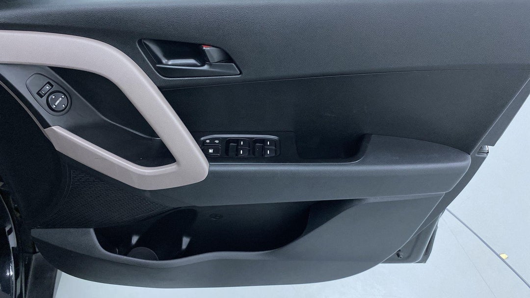 DRIVER SIDE DOOR PANEL CONTROLS