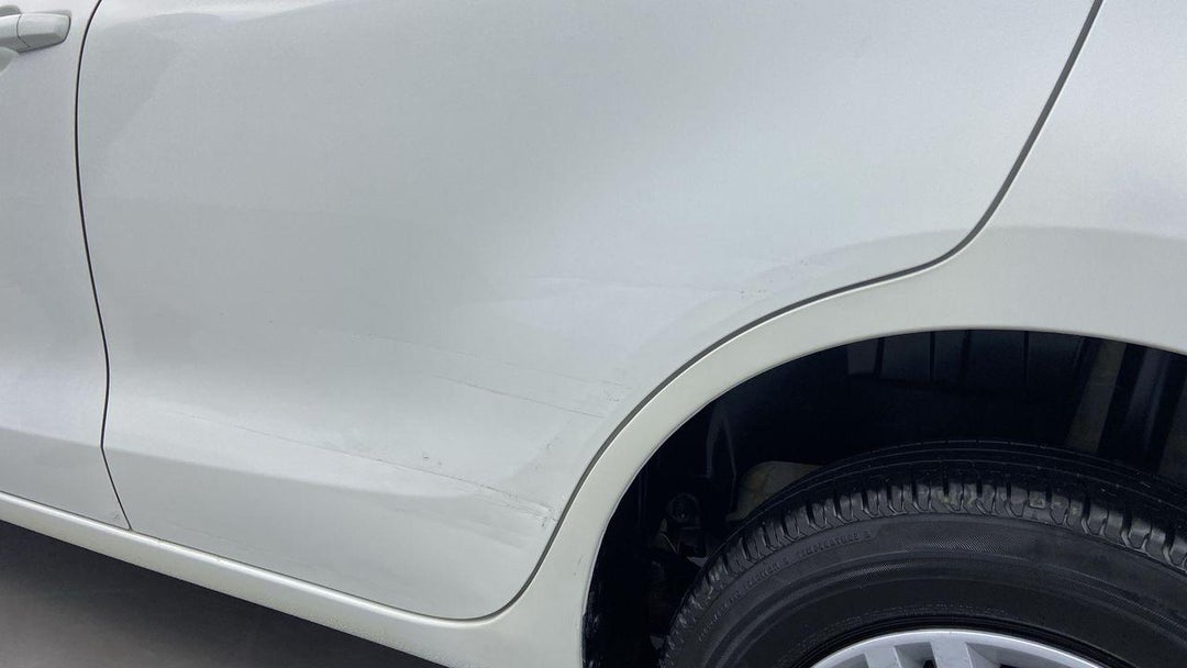 Left Rear Door Dent (6 to 9 inches)