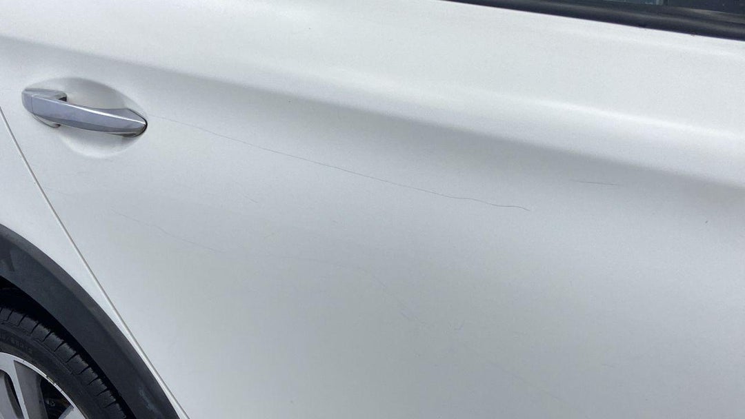 Right Rear Door Scratched (8 to 9 inches)